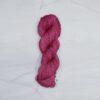 Semisolid Spinach Leaf Superwash Merino yarn.